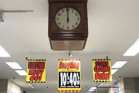 Signs in a local Sears store indicating they are going out of business. Sears was once America's largest retailer.のeditorial素材