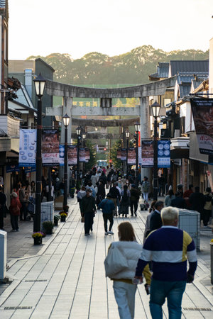 November 16,2022:Fukuoka,Japan: view along shoppiung street infront of Dazaifu Tenmangu temple shrine with many tourist visiting in autumn fall daytimeのeditorial素材