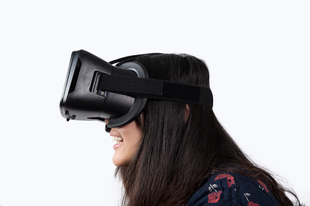 Asian girl using VR glassesの写真素材