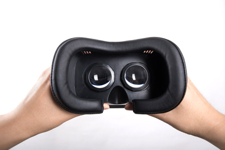 Hand holding VR glassesの写真素材