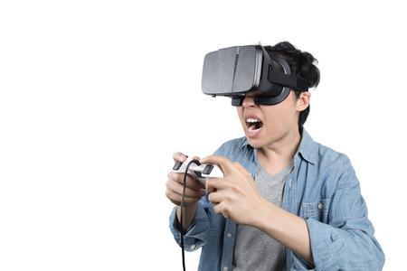 Asian man playing game with VR glassesの写真素材