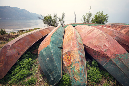 Broken boats on the groundの写真素材