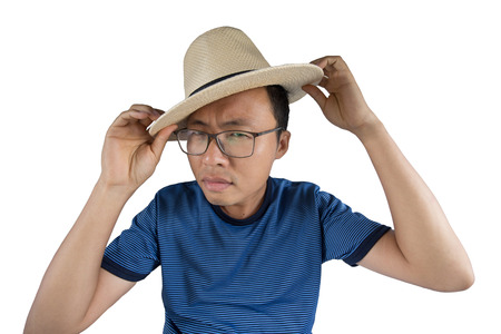 Asian man holding hatの写真素材
