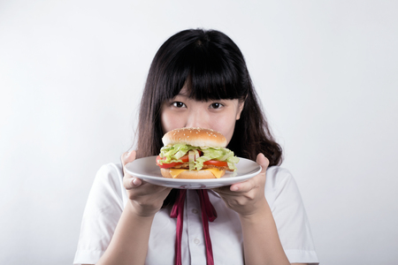 girl with hamburgerの写真素材