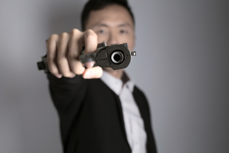 man with gunの写真素材