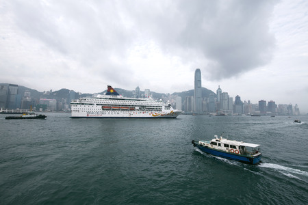 hongkong,china - may,12,2017:cruise ship in hongkong victoria harbor,this is busy harbor in asia.のeditorial素材