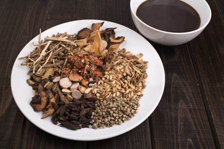 chinese herb medicine tea on tableの写真素材