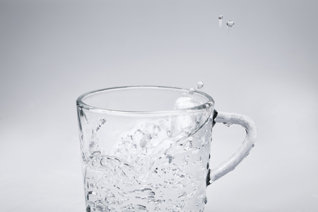 pure water flowing into the cupの写真素材