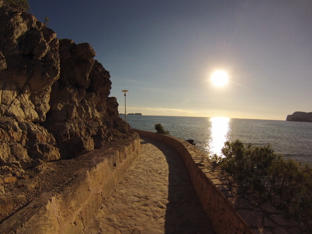 way to the beach with the sunsetの写真素材