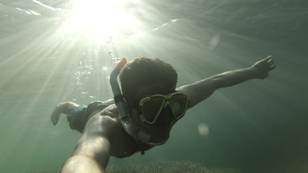 clear diving underwaterの写真素材