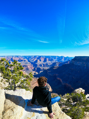 man enjoy the views on nevada, california and utah, grand canyon and horse shoe, great western of usa.の写真素材