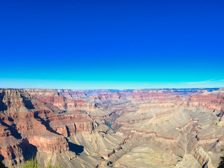 great views of western united estates, brown and red rocks colors with blue sky and river. grand canyon, horse shoe, yosemite.の写真素材