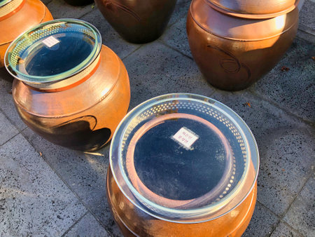 jars of korean sauce did with hands and fermentationの写真素材