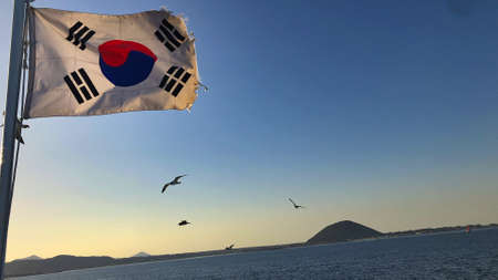 flag from south korea moving on the sky with nice clear view on the back