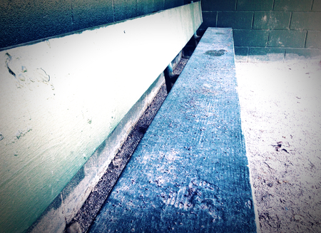 Cold look at a baseball bench and dugoutの写真素材