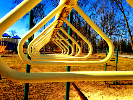 Yellow monkey bars at a parkの写真素材