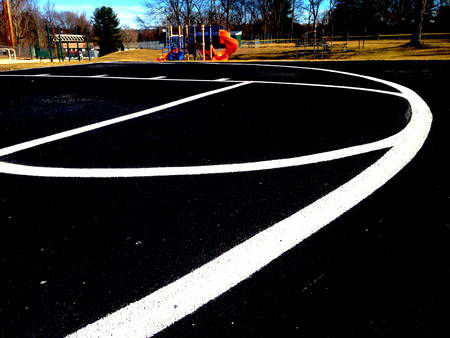 Low angle of basketball court at parkの写真素材