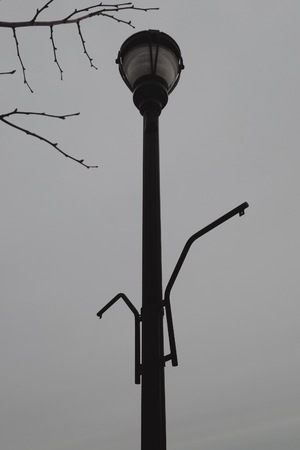 Lamp post with gray backgroundの写真素材