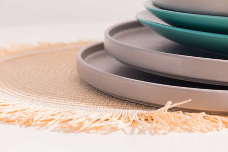 Handmade dishes stacked on a table, minimalist decoration in the Nordic styleの写真素材