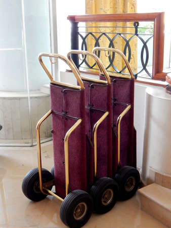 unuse trolleys are parked on the lobby hotelのeditorial素材