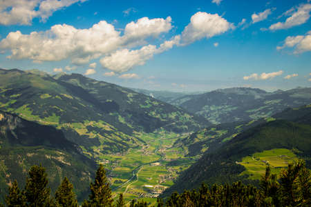 Panorama view from the moutain "Ahornberg" in Zillertal / Austria to the valleyの写真素材