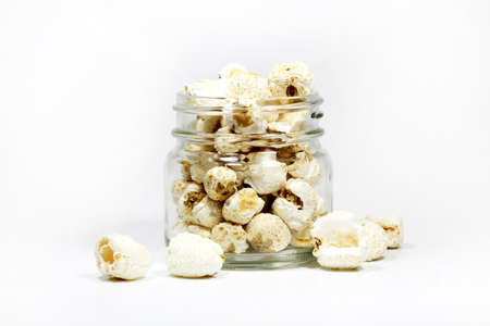 Popcorns in glass bottleの写真素材
