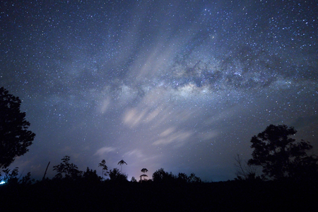 Starry night sky and milky way galaxy with stars and space dust in the universeの写真素材