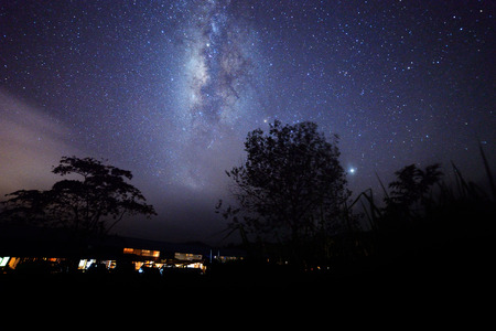 Starry night sky and milky way galaxy with stars and space dust in the universeの写真素材