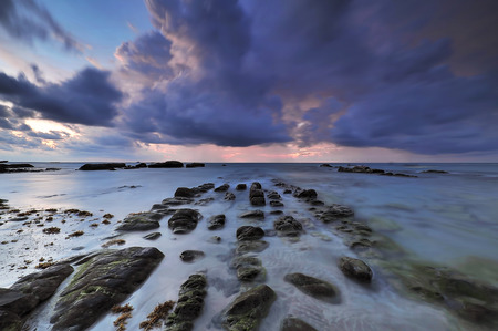 Nature in twilight period which including of sunrise over the sea and the nice beachの写真素材