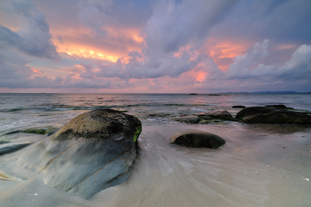 Nature in twilight period which including of sunrise over the sea and the nice beachの写真素材