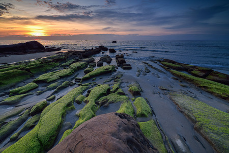 Nature in twilight period which including of sunrise over the sea and the nice beachの写真素材