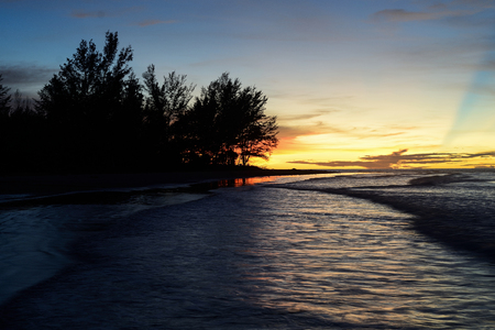 Nature in twilight period which including of sunrise over the sea and the nice beachの写真素材