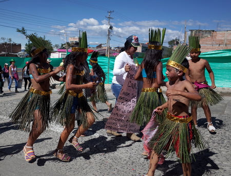 5TH JANUARY 2015, CHICHAGUÃ, COLOMBIA - dancers in traditional indigenous clothes take part in the celebrations at the Carnival de Blancos y Negros (Blacks and White Carnival) in ChichaguÃ­ near Pasto in Colombiaのeditorial素材