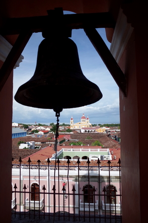 A view of Granada Cathedral from the bell tower of the Iglesia de Merced in Nicaraguaの写真素材