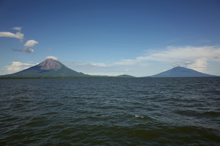 On the way to Isla Ometepe with a view of the twin volcanoes, Concepcion and Maderasの写真素材