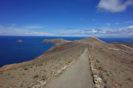 A hiking trail through the Isla Del Sol on Lake Titicacaの写真素材