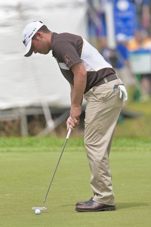 OAKVILLE, ONTARIO - JULY 22, 2009: William Chesney Reavie, known to the golf world as "Chez", putts at a Pro-am event at the100th Canadian Open at Glen Abbey Golf Course on July 22, 2009 in Oakville, Ontario.のeditorial素材