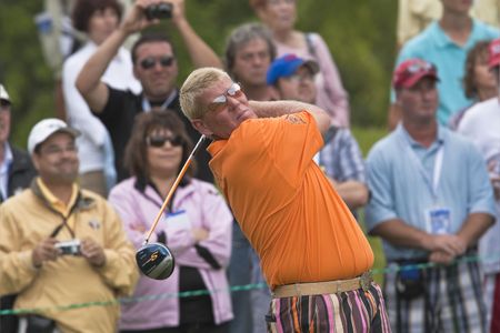 OAKVILLE, ONTARIO - JULY 22: Golfer John Daly follows his tee shot during a pro-am event at the Canadian Open golf on July 22, 2009.
のeditorial素材