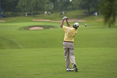 OAKVILLE, ONTARIO - JULY 22, 2009 : Golfer Stephen Ames follows his tee shot during a pro-am event at the Canadian Open golf on July 22, 2009.のeditorial素材