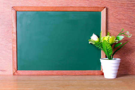 Green school chalkboard with written sentence spaceの写真素材