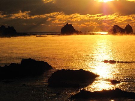 Shining sunrise and fog winter sea. Japanの写真素材