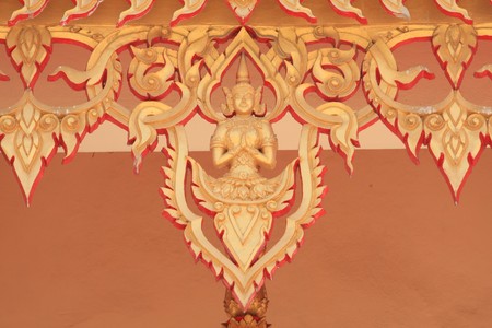 A buddha sculpture on the church wallの写真素材