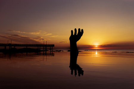 Hand of Mutual Shake in Homigot Sunrise Squareの写真素材