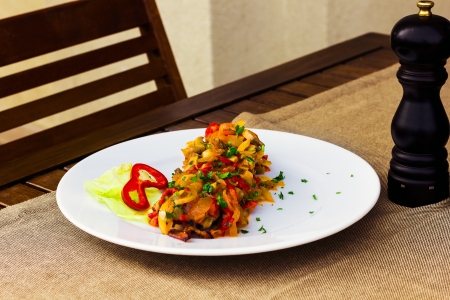 Delicious  meat with vegetables on plateの写真素材