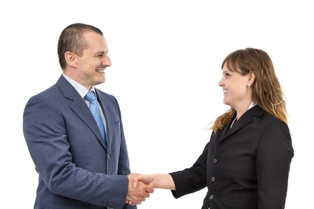 Portrait of successful business people shaking hands on a deal on a white backgroundの写真素材