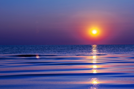 Beautiful sunrise in the seaの写真素材