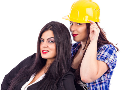 Portrait of two young businesswomen on white background