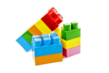 Colorful  toy plastic building blocks isolated on white backgroundの写真素材