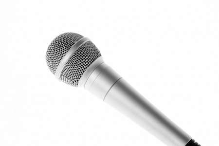 Aluminium professional concert microphone closeup isolated on white backgroundの写真素材
