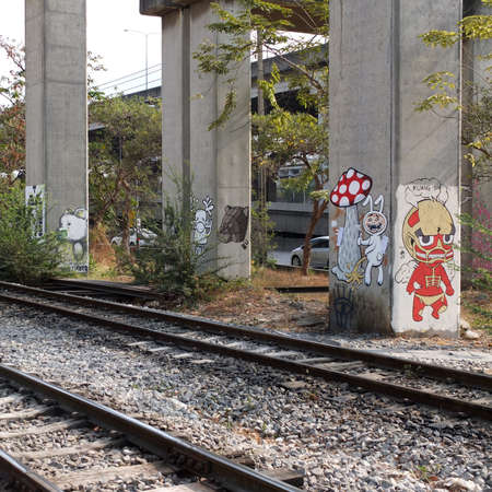 graffiti on pillar near rail wayのeditorial素材
